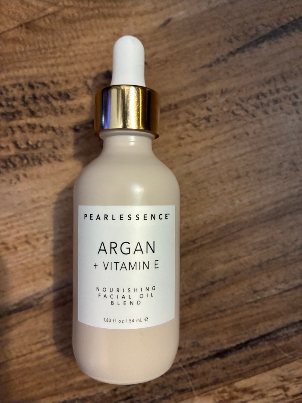 NWT Pearlessence Argan and Vitamin E nourishing facial oil blend blend. 2 oz